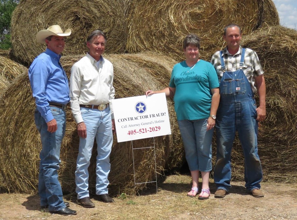 Group in front of a haystack